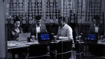 Pixel-art scene of professionals collaborating